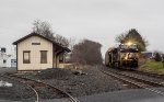 NS 4416 leads westbound empty auto racks past the ex-Reading Company depot in Mertztown, PA
